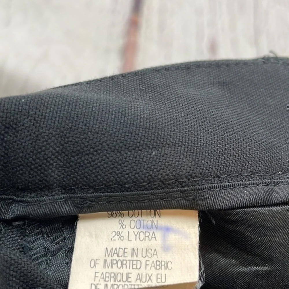 UEC theory black flat front shorts Midrise size 4